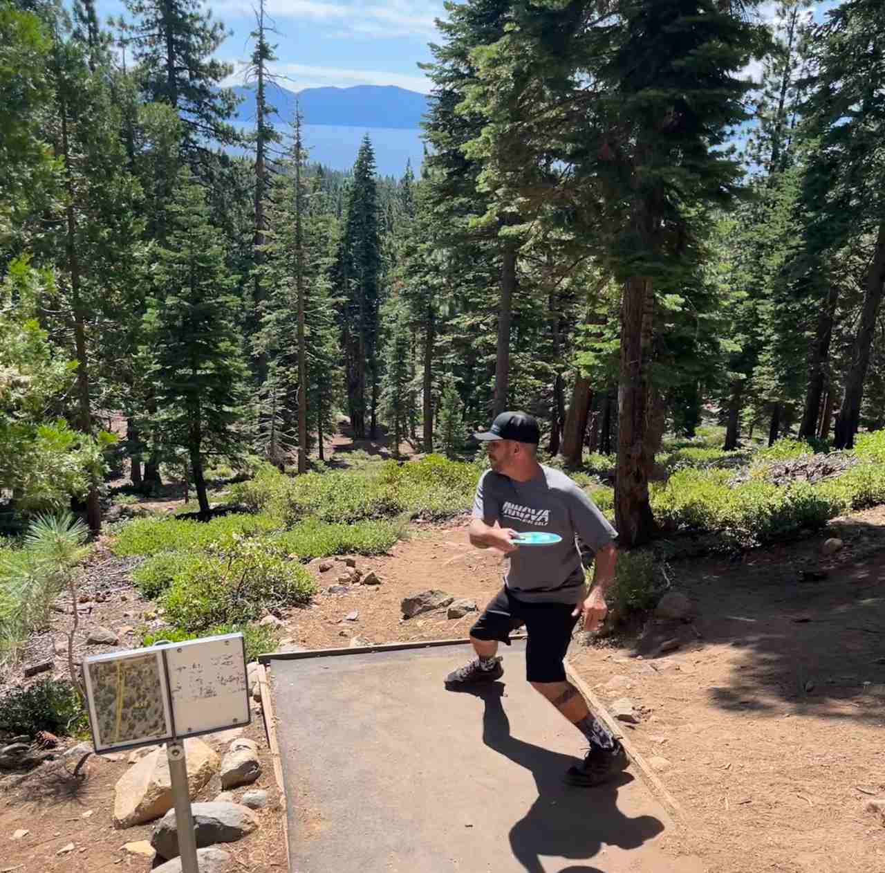 Man playing disc golf