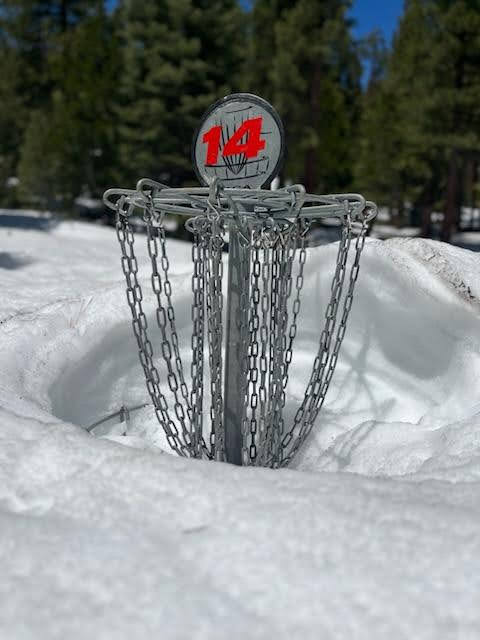 Disc golf net in the snow