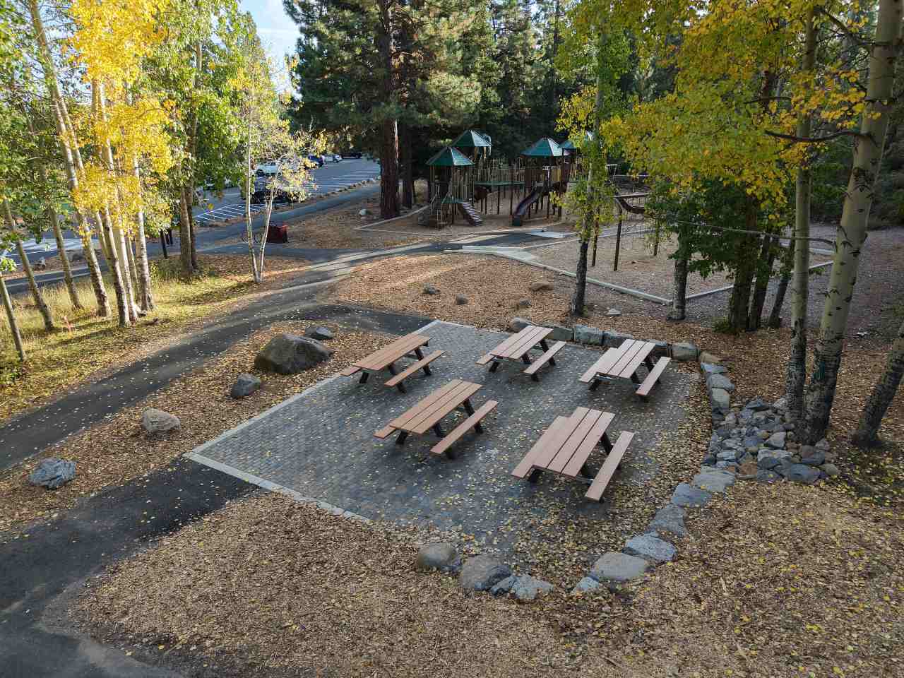 aerial view of playground plaza picnic benches and playground