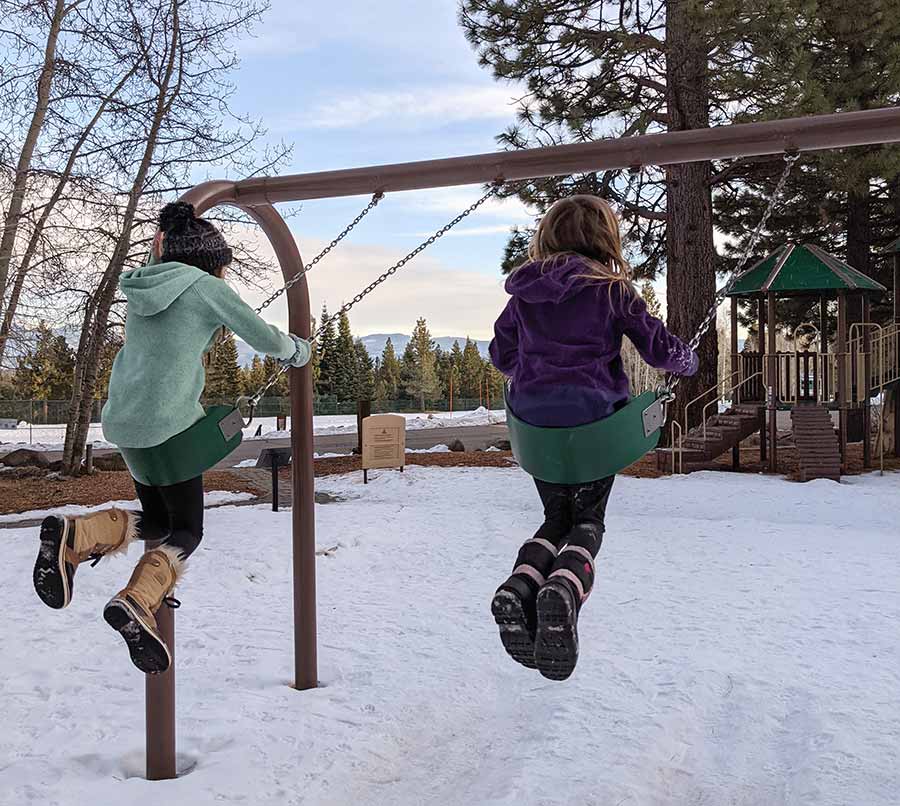 Girls on swings at North Tahoe Regional Park