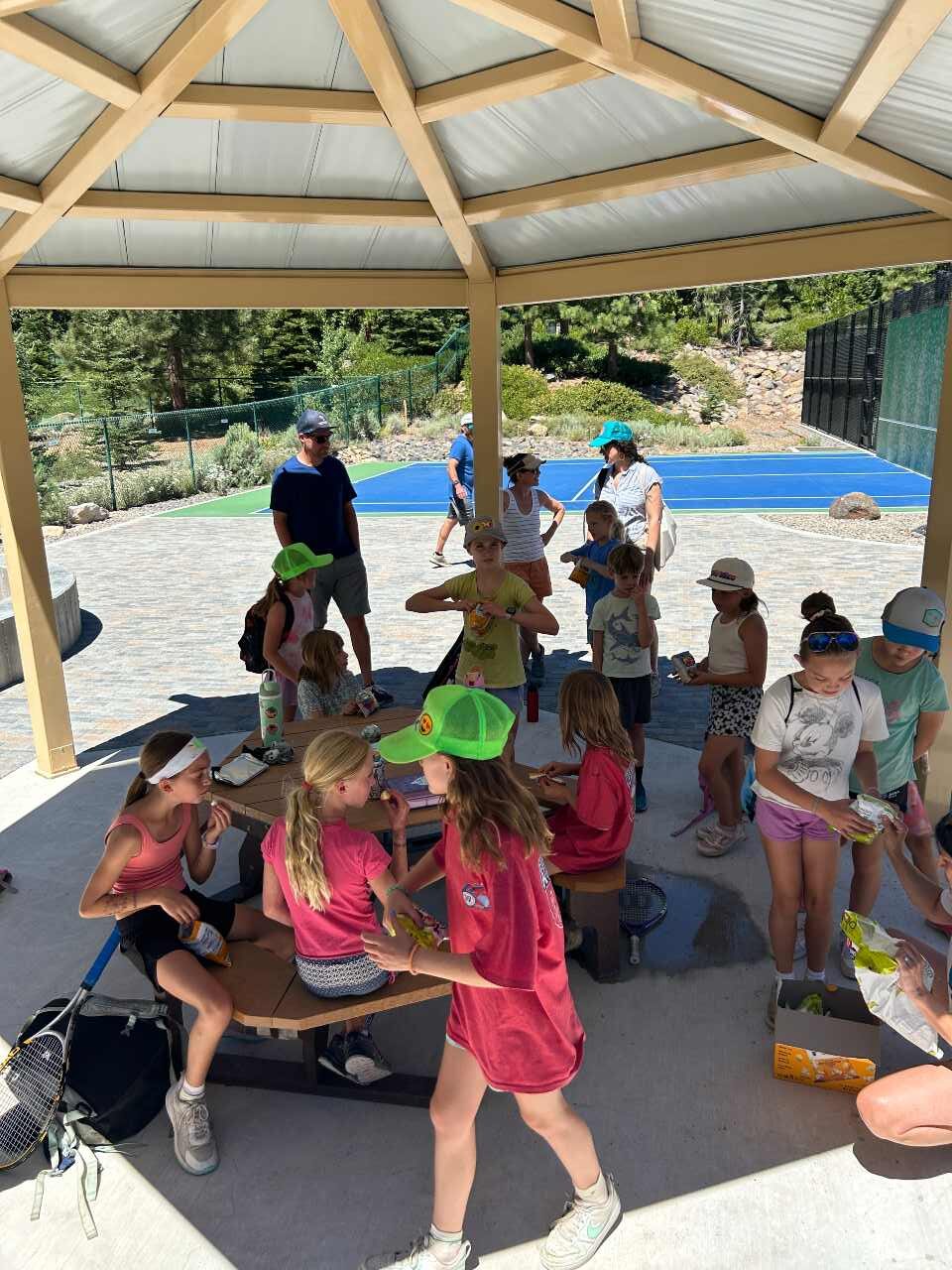 party gathering under shade of gazebo